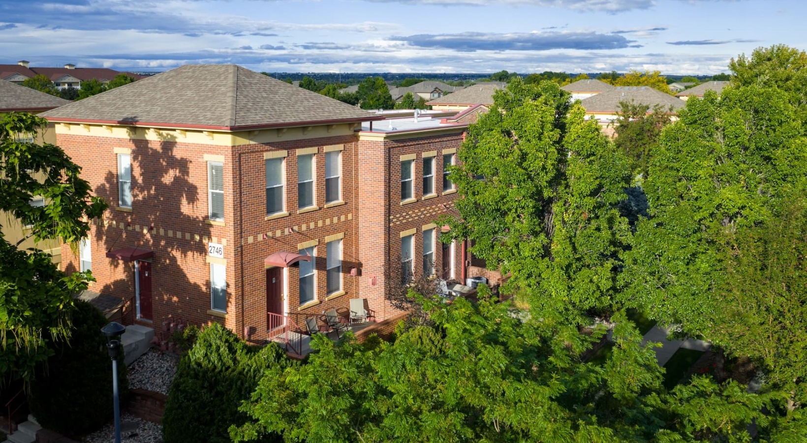 A new standard of living exteriors showing landscaping