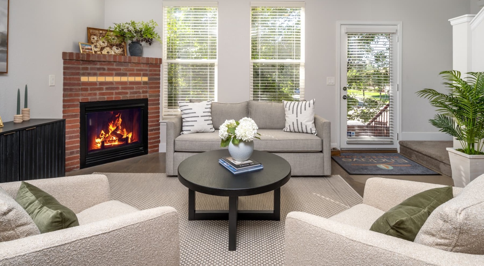 Spacious living areas living room with a fireplace