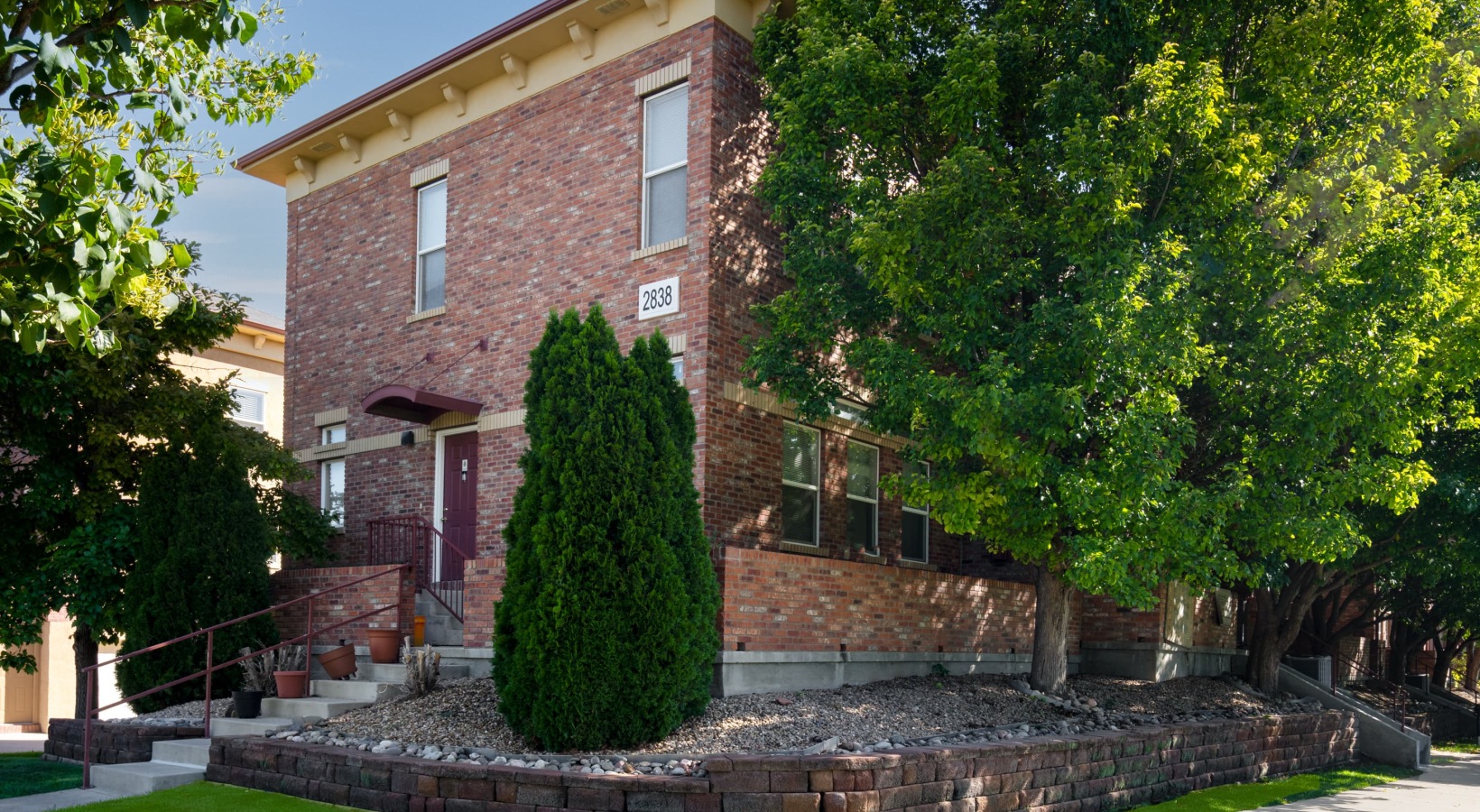 All the comforts of luxury living exterior of buildings with nearby landscaping