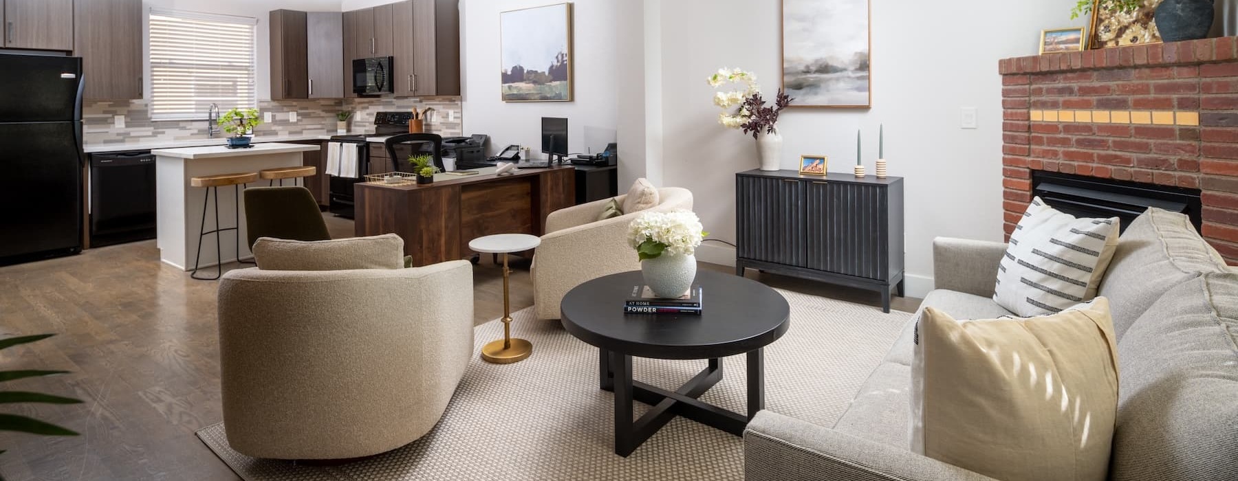 living area that includes ample seating spaces and bright lighting