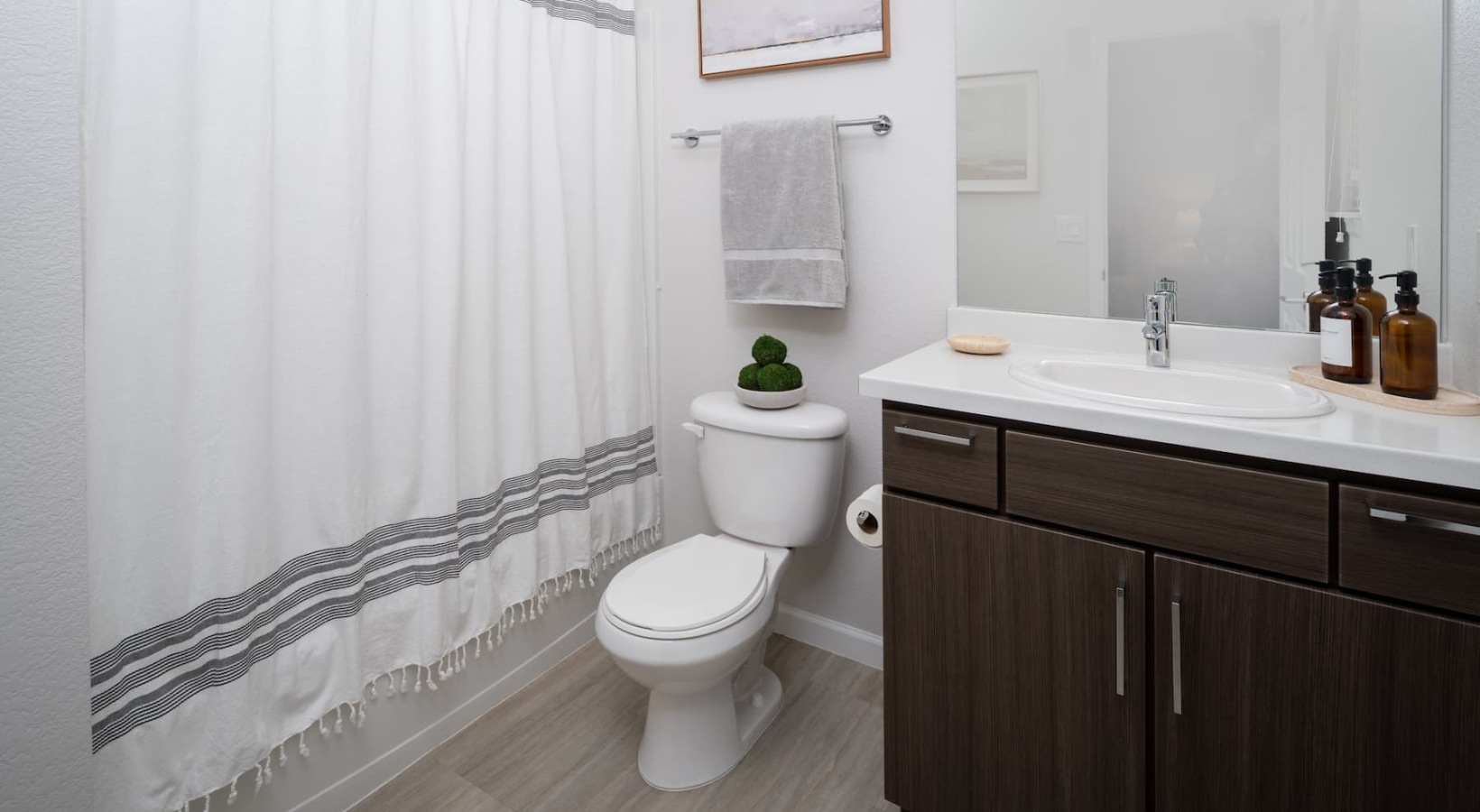 Bath areas with modern fixtures bathroom with a large mirror and walk-in shower