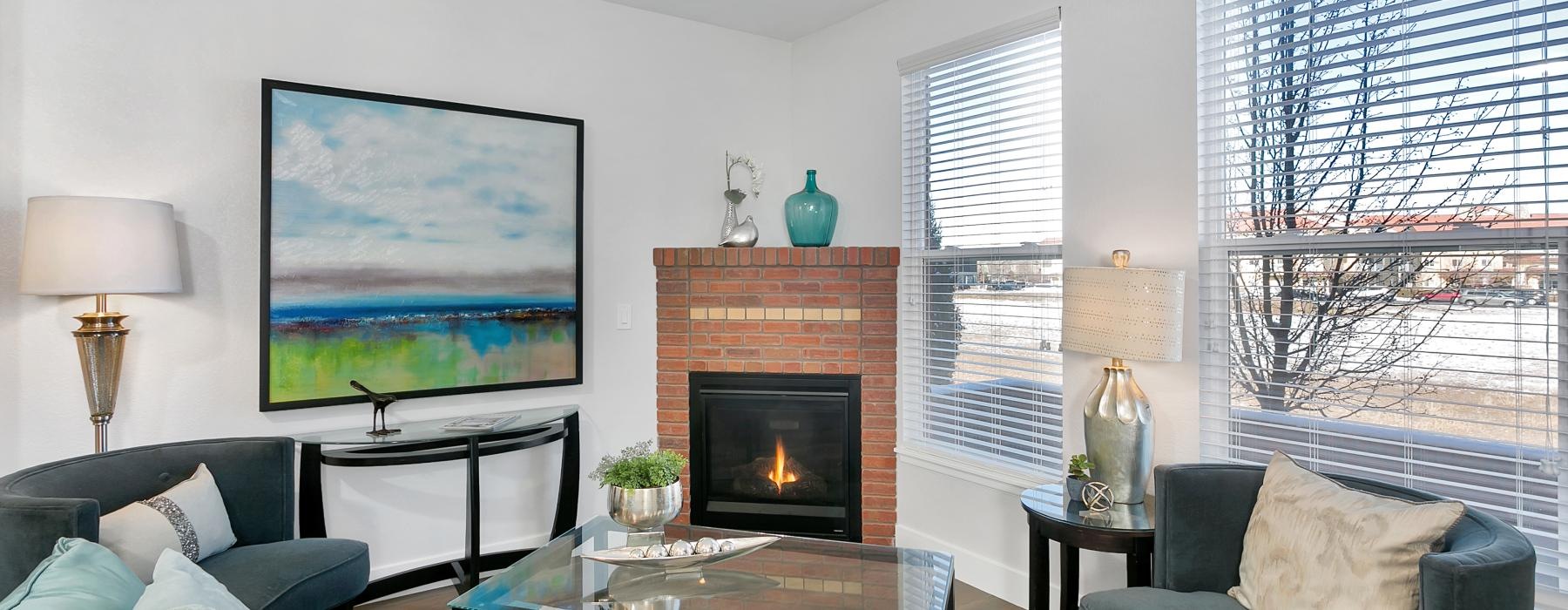 a living room with a fireplace