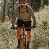 a man on a mountain bike